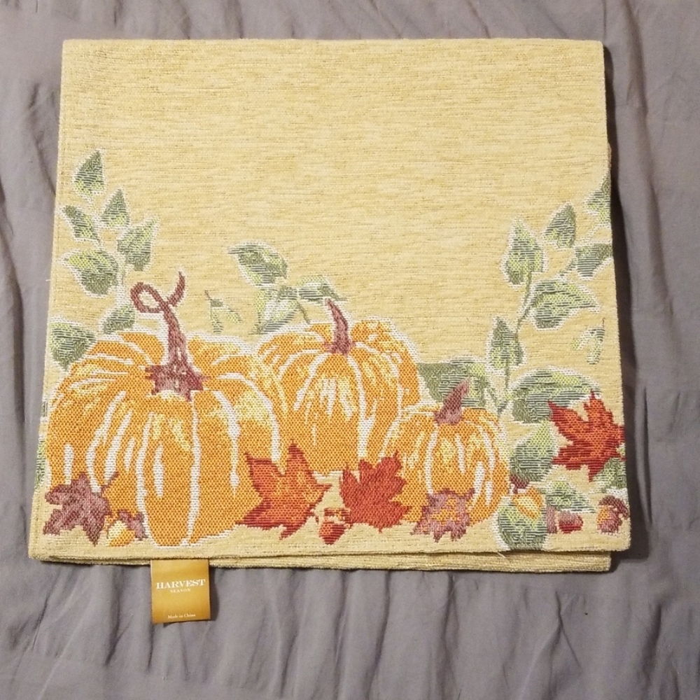 Thanksgiving table runner with pumpkins and leaves